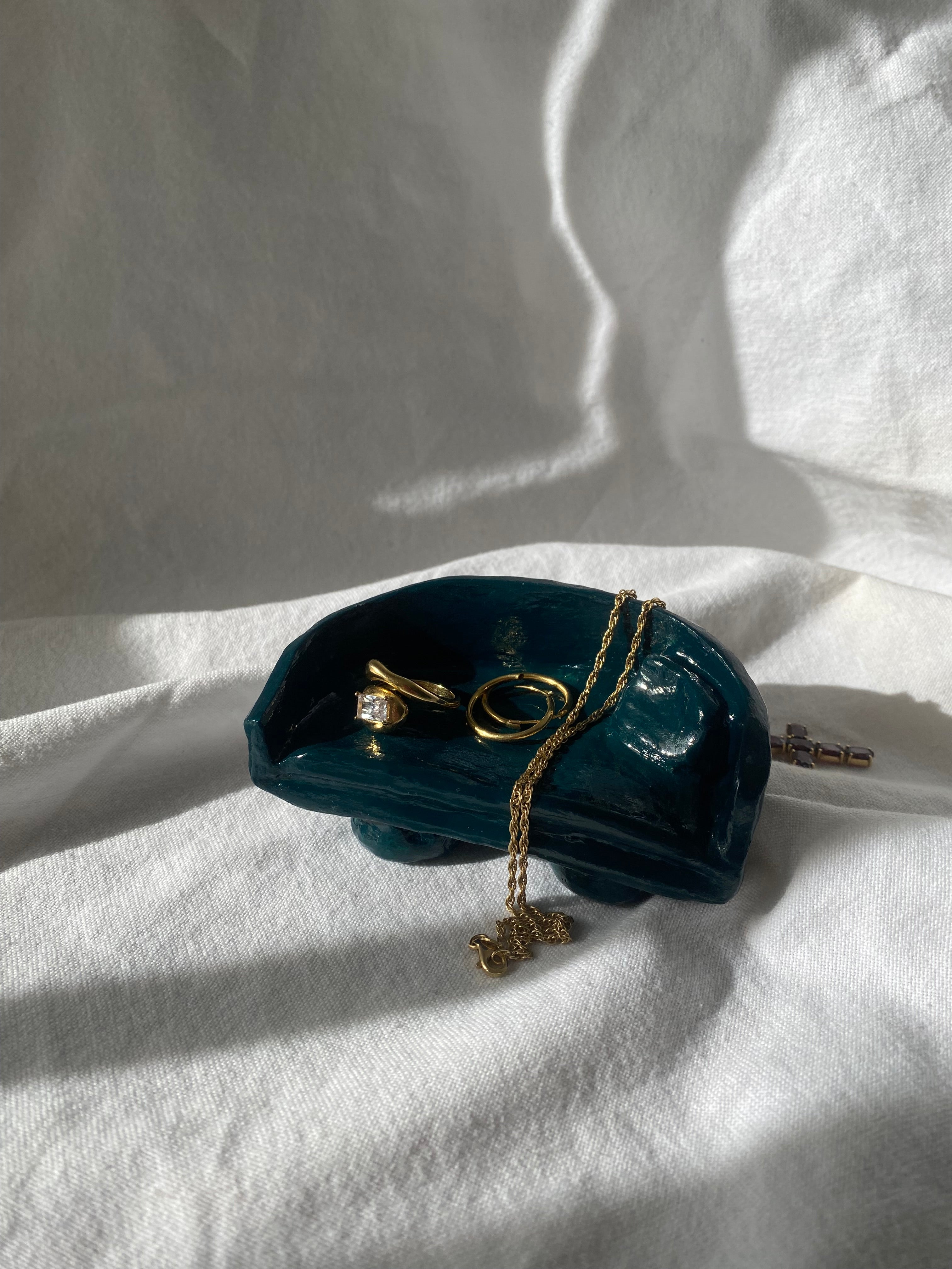 Repose-bijoux canapé