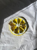 Repose-bijoux citron